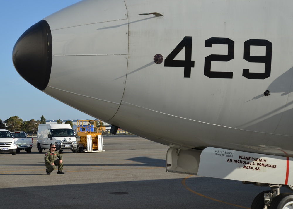 U.S. Navy Aircrewman Monitors P-8A Poseidon Before Assisting in MH370 Search