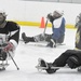 Sled Hockey Showdown: Rampage Forward Scores on Army Goaltender in Practice