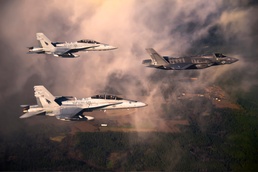 U.S. Marine Corps F-18 Hornets Escort F-35 Lightning II to Eglin Air Force Base