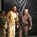 Comedian Tommy Davidson Recognizes Promoted Soldier at New Year's Comedy Show in Afghanistan