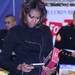 First Lady Lends a Hand Sorting Toys for Troops