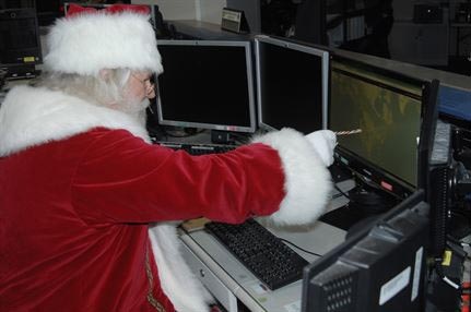 Santa Claus Prepares for Christmas Eve Flight at NORAD Headquarters