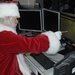 Santa Claus Prepares for Christmas Eve Flight at NORAD Headquarters