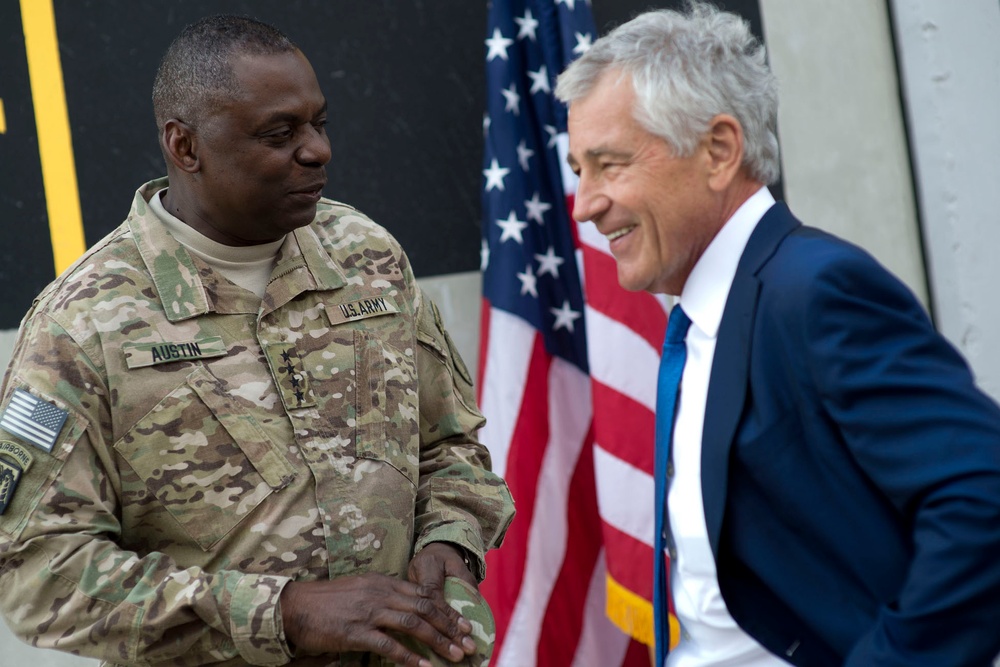Hagel, Austin Share Laugh at Al Udeid Air Base in Qatar