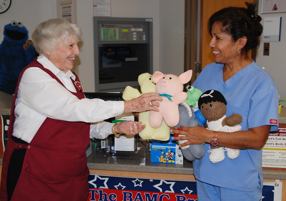 Volunteers Donate Handmade Toys to Military Hospital's Pediatric Clinic