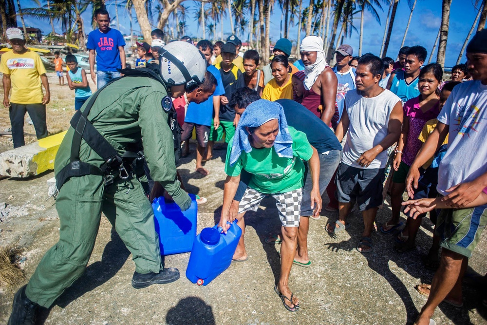 Navy Petty Officer Delivers Water to Typhoon Victims in Philippines
