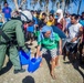 Navy Petty Officer Delivers Water to Typhoon Victims in Philippines