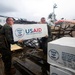 Navy Corpsman and Marine Sergeant Load Supplies for Typhoon Haiyan Relief Efforts in the Philippines