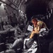 Service Member Reads During Long Military Flight