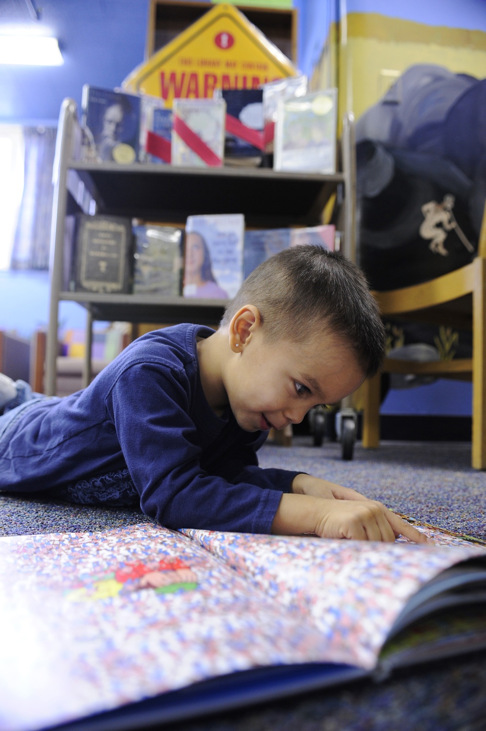 Airman's Son Reads at Base Library