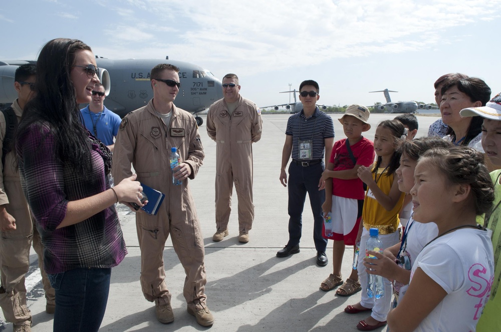 Air Force Officer Explains Aircraft Role to Kyrgyz Students at Manas Transit Center