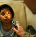 Air Force Doctor Provides Eye Care to Afghan Child