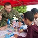 U.S. and Canadian Forces Teach Tongan Children Dental Health at Pacific Partnership 2013