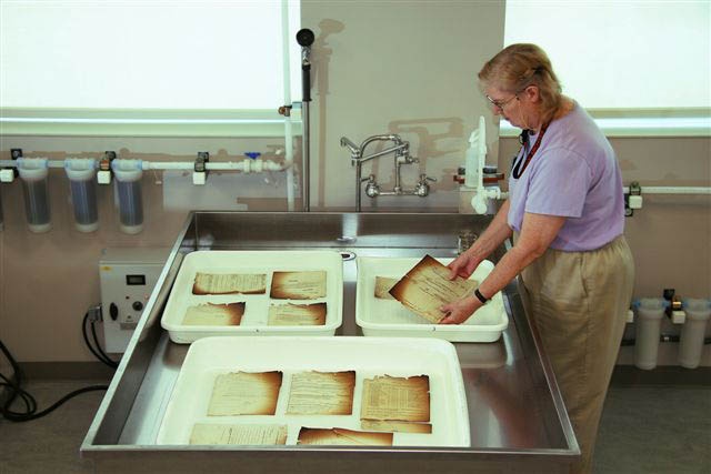 Preserving Military History: Technician Restores Damaged Personnel Records