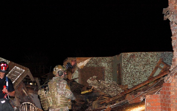 Guardsman and Firefighter Search Tornado Rubble for Survivors in Moore, Oklahoma