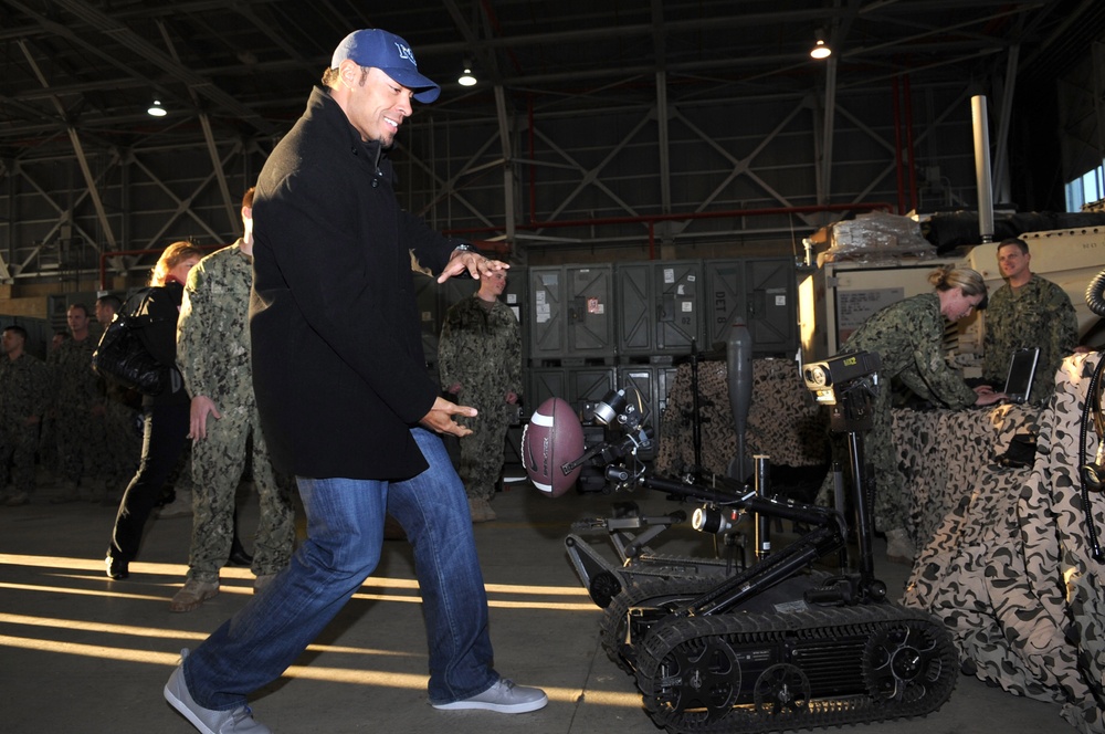 NFL Star Vincent Jackson Receives Football from Explosive Ordnance Disposal Robot in Spain