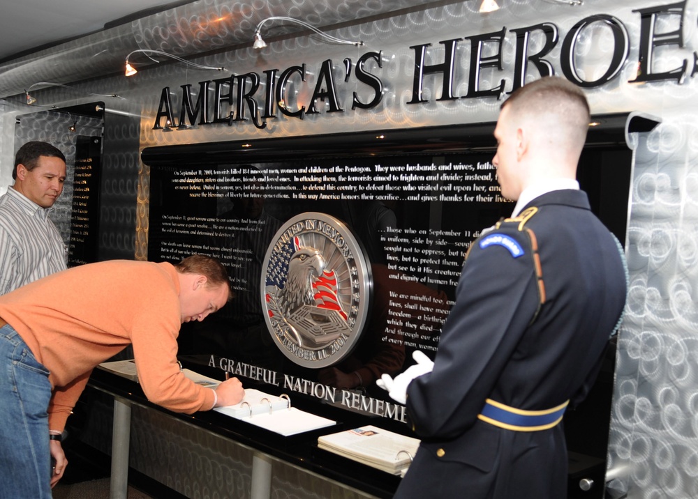 Peyton Manning Signs Pentagon 9/11 Memorial Guest Book on USO Tour