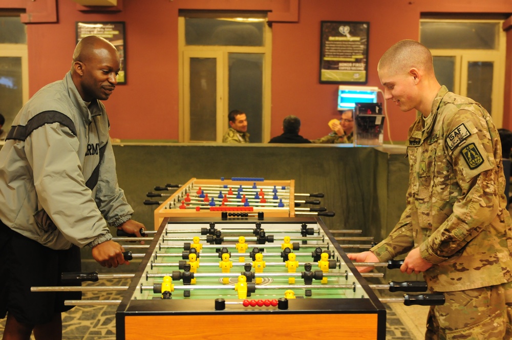 Soldiers Unwind with Pool Game During Deployment