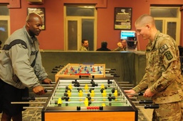 Soldiers Unwind with Pool Game During Deployment