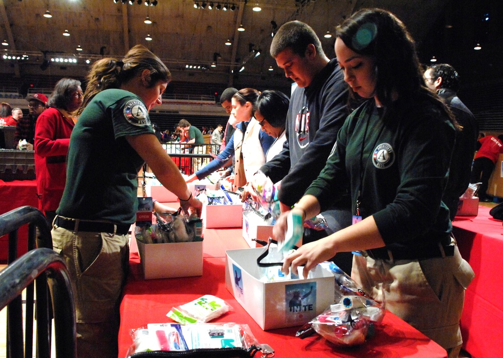 Volunteers Pack Care Kits for Deployed Troops at National Service Event
