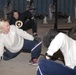 Air Force Captain Leads Early Morning Workout for Troops in Afghanistan