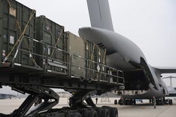 U.S. Airmen Load Cargo for NATO Missile Defense Mission in Turkey