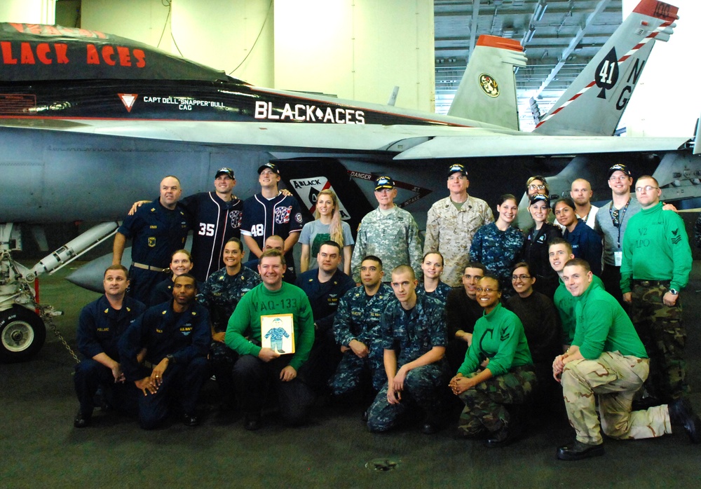 Top Military Leaders Join USO Celebrities for Holiday Visit Aboard USS John C. Stennis