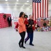 First Lady Delivers Toys for Tots at Military Base