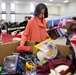 First Lady Lends a Hand at Toys for Tots Distribution Center
