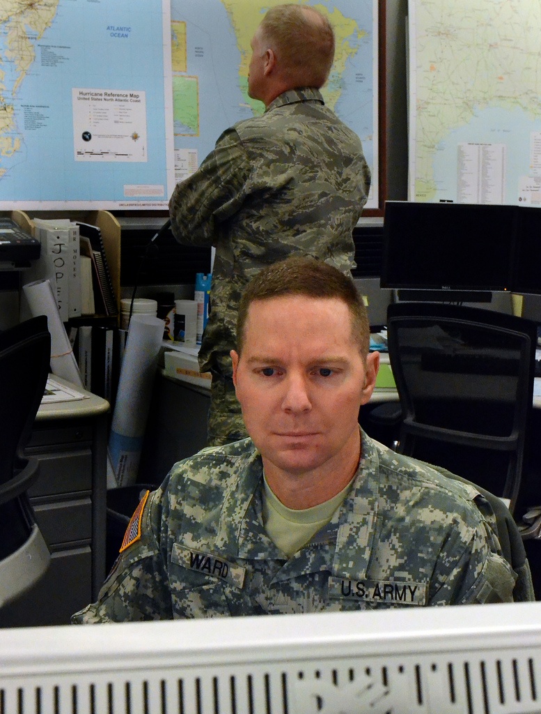 U.S. Military Officers Coordinate Operations at Transportation Command Fusion Center