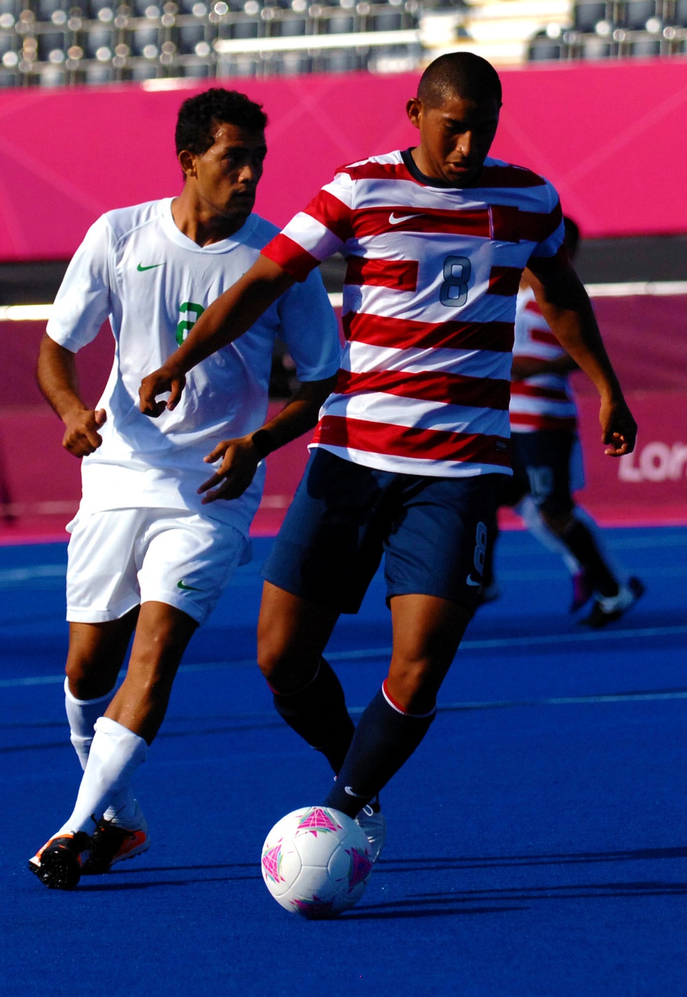 Marine Corps Cpl. Rene Renteria Dribbles Past Brazilian Opponent at Paralympic Games