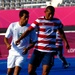 Marine Corps Cpl. Rene Renteria Dribbles Past Brazilian Opponent at Paralympic Games