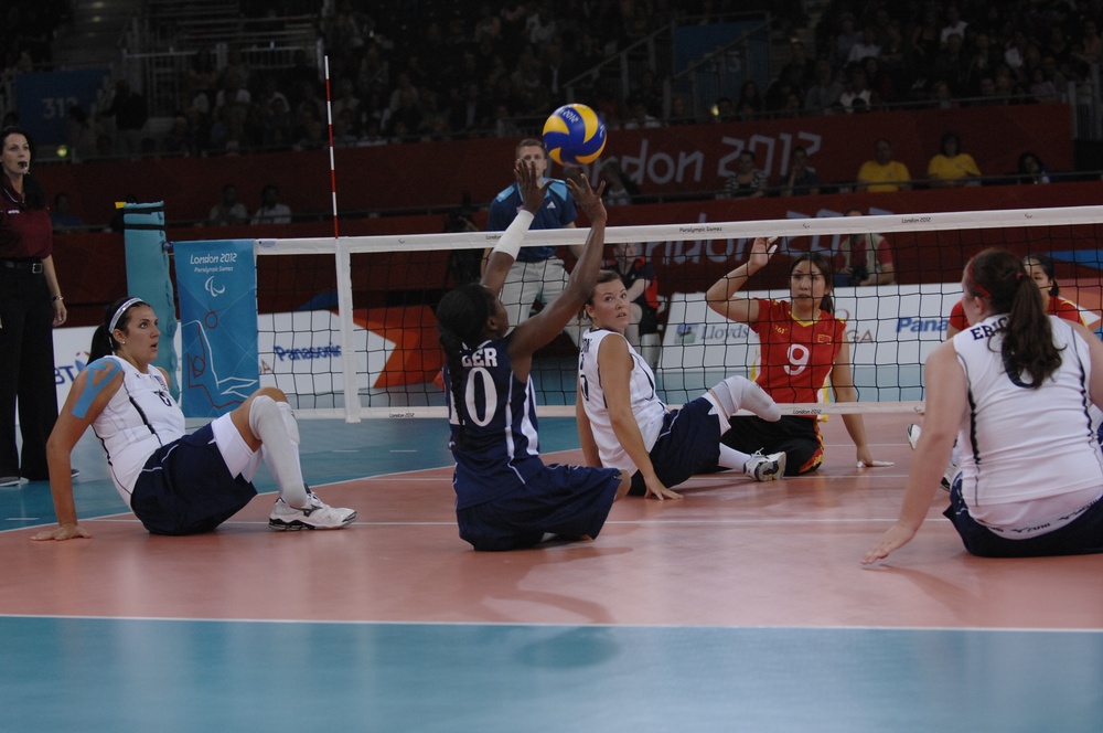 Former Army Sergeant Kari Miller Sets Volleyball for U.S. Women's Sitting Volleyball Team at 2012 Paralympics