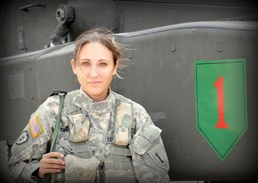 Army Chief Warrant Officer 2 Pilots Apache Helicopter at Fort Riley