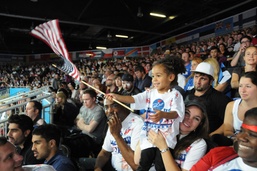 Daughter Cheers on Father at Olympic Greco-Roman Wrestling