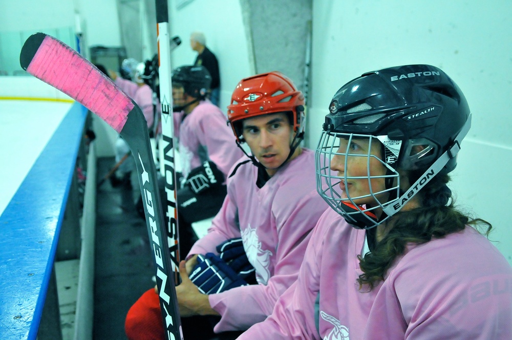 Married Air Force Officers Enjoy Hockey Together