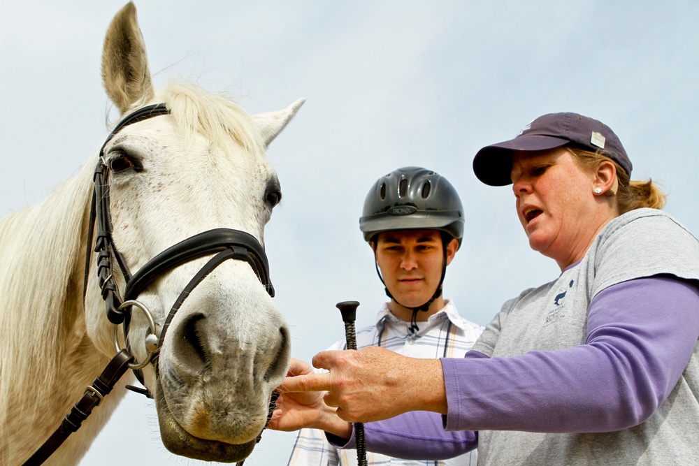 Army Sgt. Learns Proper Horse Tack Fitting at Therapeutic Riding Program