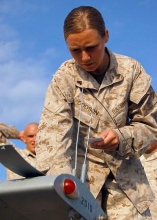 Marine Corps Radio Operator Prepares Unmanned Aerial Vehicle for Launch