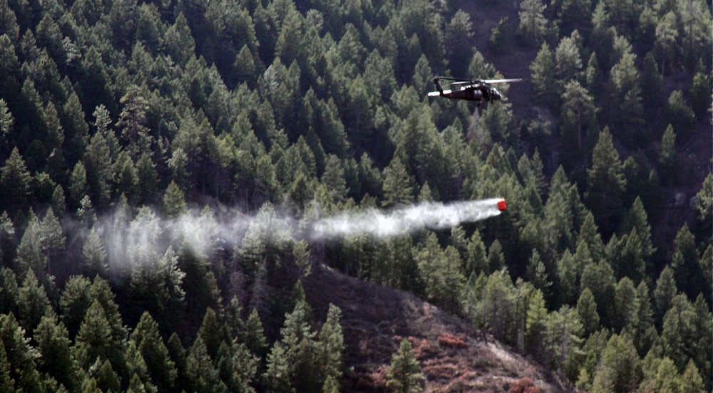 Colorado National Guard Helicopter Drops Water on Lower North Fork Fire