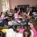 Bosnian Students Practice English with U.S. Officials After School Renovation