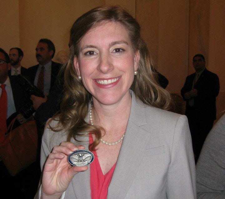 Finalist for National Teacher of the Year Poses with Husband and Education Secretary