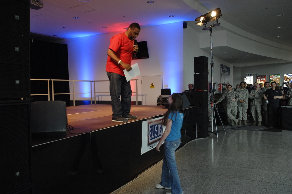 Actor Anthony Anderson Surprises Teen Fan on Stage for 15th Birthday at Ramstein Air Base