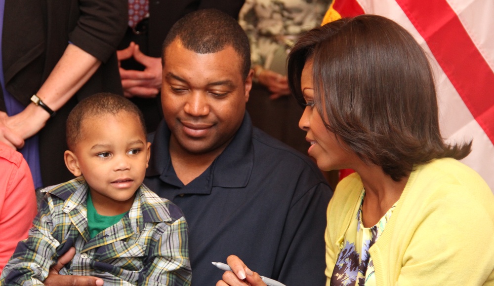 First Lady Warmly Greets Young Military Family Member at Walter Reed