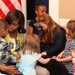 First Lady Reaches Out to Shy Child at Military Medical Center