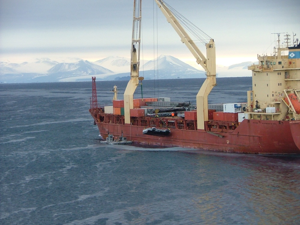 Crane Hoists Modular Causeway Aboard USNS Green Wave in Antarctica