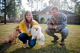 Air Force Family Poses with Beloved Pets