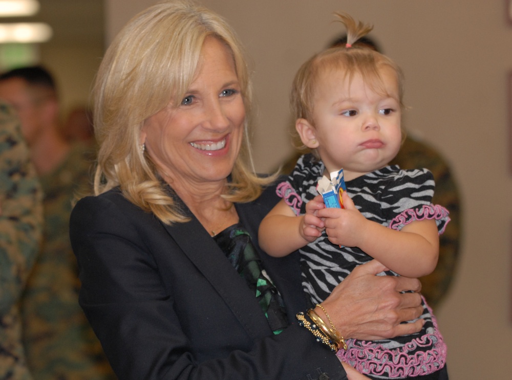 Dr. Jill Biden Comforts Gold Star Wife's Daughter During Visit to Marine Unit