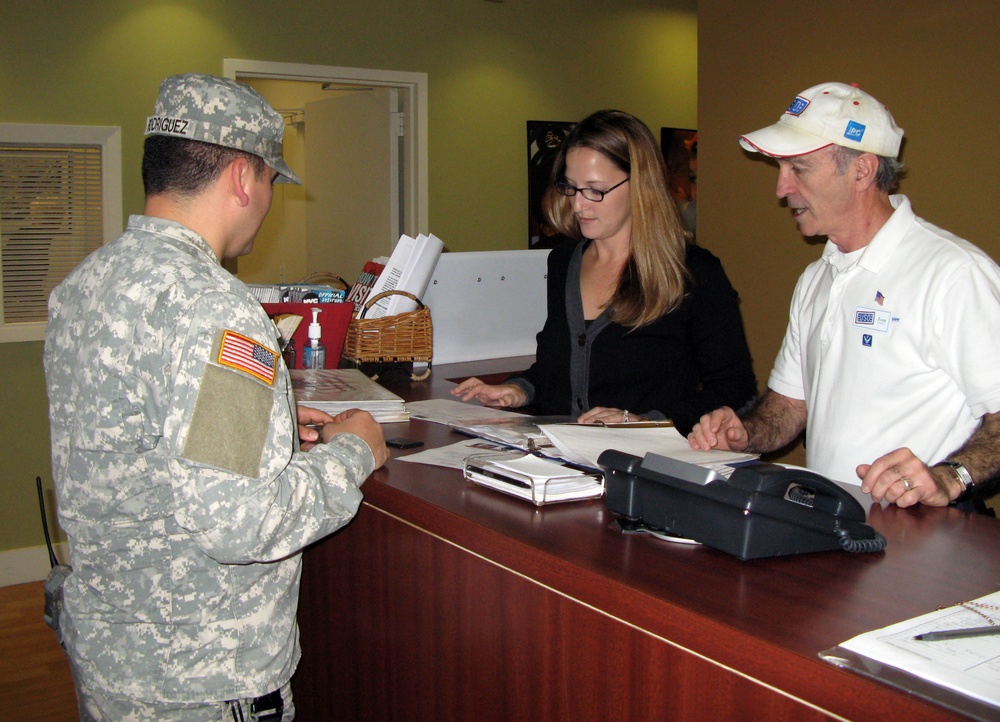 USO Volunteers Assist National Guard Soldier, Continuing 70-Year Legacy