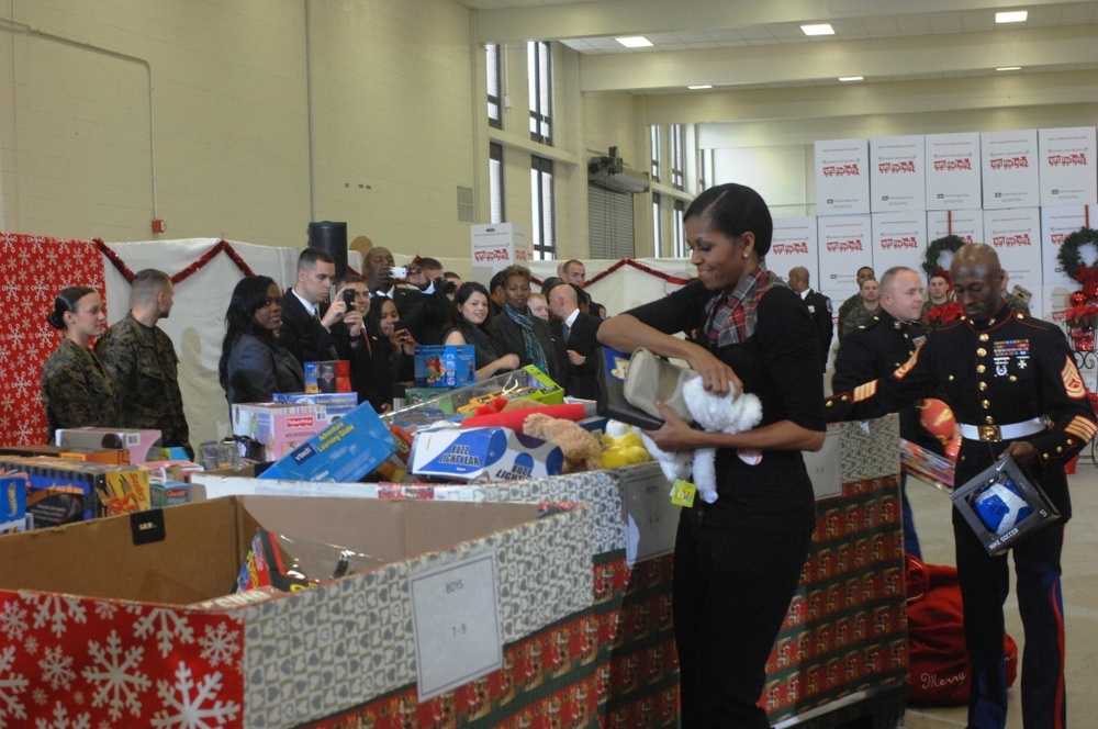 First Lady Helps Marines Sort Toys for Tots at Joint Base