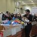 First Lady Helps Marines Sort Toys for Tots at Joint Base